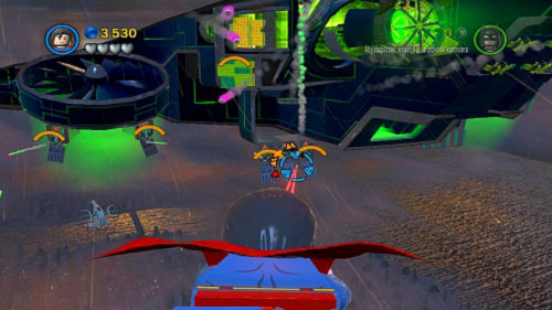 In the first part of mission you will have to destroy enemy choppers and underbelly points of plane (picture) - they will be marked - Destination Metropolis | Walkthrough - Walkthrough - LEGO Batman 2: DC Super Heroes Game Guide & Walkthrough