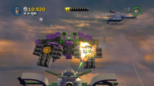 At the beginning of the mission just shoot down enemy choppers and planes and aim at the underbelly point of Jokers robot (picture) - they will be marked - Down to Earth | Walkthrough - Walkthrough - LEGO Batman 2: DC Super Heroes Game Guide & Walkthrough