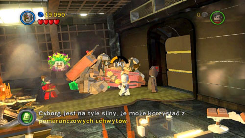 Pass the abyss and pull golden handle with Cyborg (picture) - Tower Defiance | Walkthrough - Walkthrough - LEGO Batman 2: DC Super Heroes Game Guide & Walkthrough