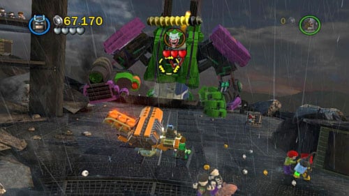 Destroy two crates standing in the centre and use bricks to build a gun - Tower Defiance | Walkthrough - Walkthrough - LEGO Batman 2: DC Super Heroes Game Guide & Walkthrough