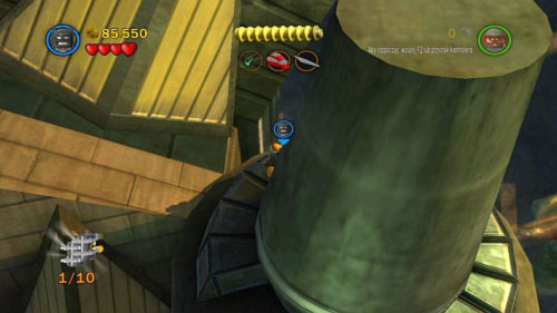 #06 - On the round pillar with the last part for the chopper - Harboring a Criminal | Minikits - Minikits - LEGO Batman 2: DC Super Heroes Game Guide & Walkthrough