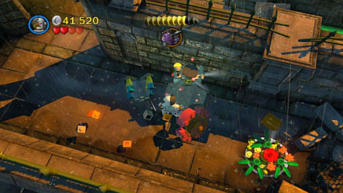 #02 - At the beginning move right and destroy black gate using Lexs weapon - Arkham Asylum Antics | Minikits - Minikits - LEGO Batman 2: DC Super Heroes Game Guide & Walkthrough