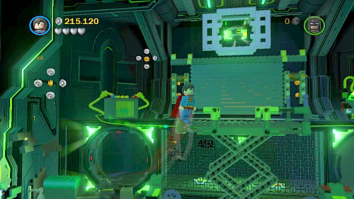 #03 - In the same location use Lex to destroy one of the black screens, move behind the fence, destroy black bricks and use both heroes to stand on the buttons (minikit will show under the ceiling) - Destination Metropolis | Minikits - Minikits - LEGO Batman 2: DC Super Heroes Game Guide & Walkthrough