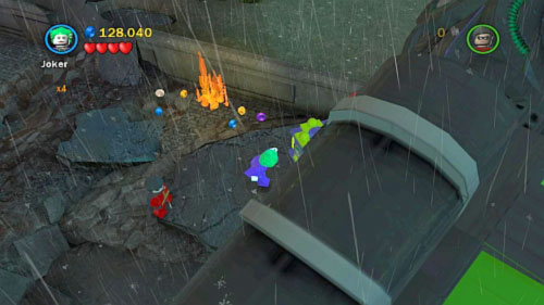 #08 - Go to the location on the right side of the rocket and open the box with Joker - Heroes Unite | Minikits - Minikits - LEGO Batman 2: DC Super Heroes Game Guide & Walkthrough