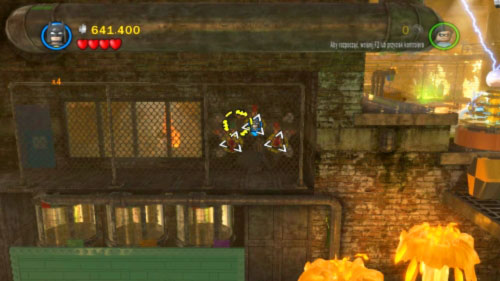 Chemical Crisis - in the burning part of factory just before location with three tanks in the floor - Citizen in peril - Other - LEGO Batman 2: DC Super Heroes Game Guide & Walkthrough