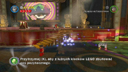 When you gain control over the hero eliminate all enemies in the location (you can also explore the down of the screen where youll find a couple of violet coins) - Theatrical Pursuits | Walkthrough - Walkthrough - LEGO Batman 2: DC Super Heroes Game Guide & Walkthrough