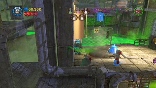 Move to the left and pull big magnesium to the right (it will open the flap) - Chemical Crisis | Walkthrough - Walkthrough - LEGO Batman 2: DC Super Heroes Game Guide & Walkthrough