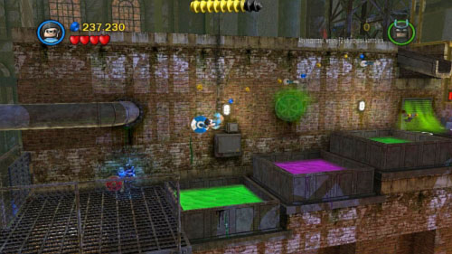 Move Batman to the right, wear electricity suit, use hook on handle to get higher and pull the handgrip - Chemical Crisis | Walkthrough - Walkthrough - LEGO Batman 2: DC Super Heroes Game Guide & Walkthrough