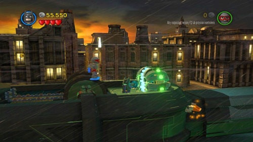 Move forward and use Batmans pistol on the green machine (picture) - Chemical Signature | Walkthrough - Walkthrough - LEGO Batman 2: DC Super Heroes Game Guide & Walkthrough