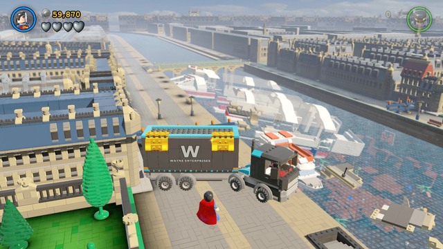 Play as Superman or Batman (Space Suit required) in order to destroy the clamps on the truck and collect the token as Batman to unlock the Scuba Suit - Europe Against It - Walkthrough - LEGO Batman 3: Beyond Gotham - Game Guide and Walkthrough