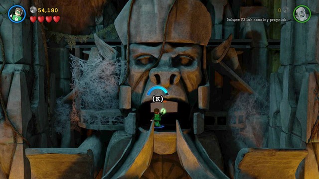 Fly up to the platform as shown in the picture and use the grappling hook to unlock the panel below - Need for Greed - Walkthrough - LEGO Batman 3: Beyond Gotham - Game Guide and Walkthrough