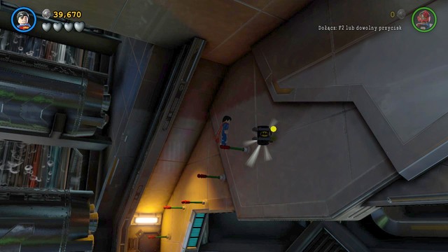 The next Minikit is hanging in the left part of the main hall - Minikits - Space Station Infestation - secrets - LEGO Batman 3: Beyond Gotham - Game Guide and Walkthrough