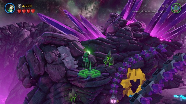 You can find the second Minikit on a rock in the second part of the location - Minikits - Power of Love - secrets - LEGO Batman 3: Beyond Gotham - Game Guide and Walkthrough