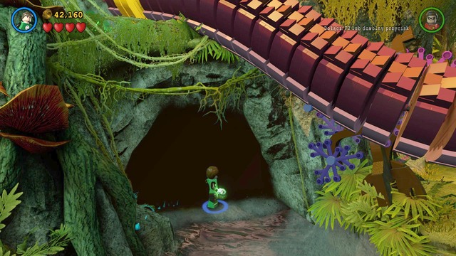 The sixth Minikit can be found in the cave, under the monsters tentacle - Minikits - A Blue Hope - secrets - LEGO Batman 3: Beyond Gotham - Game Guide and Walkthrough