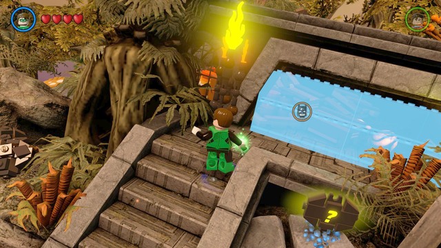 After arriving at the place, use Batmans Sonar Suit to destroy the glass barrier and step inside - Gold Bricks - Okaara - secrets - LEGO Batman 3: Beyond Gotham - Game Guide and Walkthrough