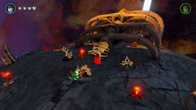 Destroy the bones that you can see in the picture using and use Supermans laser attack to burn the gold chest - Gold Bricks - Ysmault - secrets - LEGO Batman 3: Beyond Gotham - Game Guide and Walkthrough