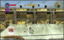 Jump onto the bench by the tent and the second character will use (WL) to lift you up - LEGO Harry Potter Years 1-4: Hogwarts Bonuses - Walkthrough - Secrets and Collectibles - LEGO Harry Potter Years 1-4 Guide & Walkthrough