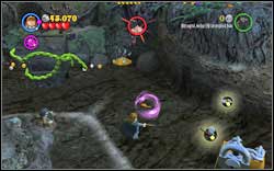 Gryffindor (red): After drilling a hole in the lake, throw all six fish into the water with (WL) - LEGO Harry Potter Years 1-4: Year 1 Bonuses - Walkthrough - Secrets and Collectibles - LEGO Harry Potter Years 1-4 Guide & Walkthrough