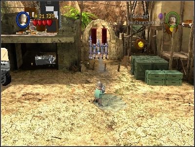 Take a rocket launcher from the room and destroy the blue gate to the right with it - Chapter 6 - Opening the Ark - Riders of the Lost Ark - LEGO Indiana Jones: The Original Adventures - Game Guide and Walkthrough