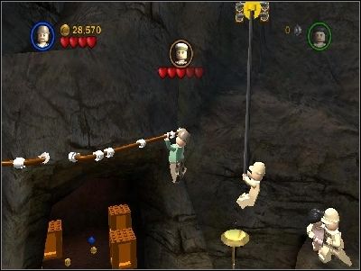 As Indy, go deeper towards the end of the cave and jump on the platform on the right side - Chapter 6 - Opening the Ark - Riders of the Lost Ark - LEGO Indiana Jones: The Original Adventures - Game Guide and Walkthrough