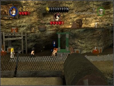 As Indy, push the cart to the right side - Chapter 4 - Free the Slaves - part 2 - The Temple of Doom - LEGO Indiana Jones: The Original Adventures - Game Guide and Walkthrough