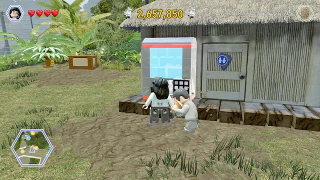 As Zara, walk to the machine and break its glass - Jurassic Park Gate | Jurassic Park - secrets in free roam - Jurassic Park - secrets in free roam - LEGO Jurassic World Game Guide & Walkthrough