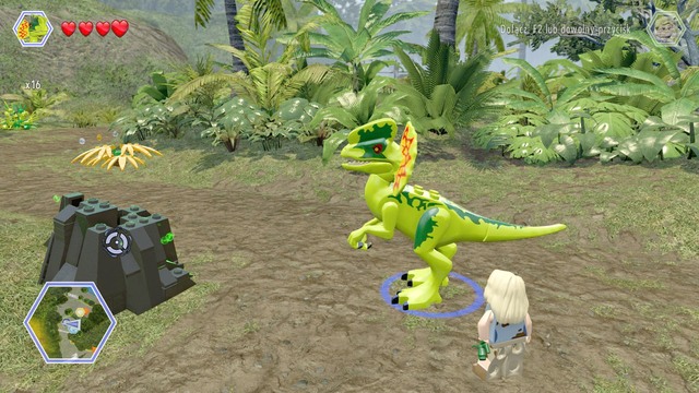 Walk to the dark rock and destroy it as dilophosaurus - Jurassic Park Gate | Jurassic Park - secrets in free roam - Jurassic Park - secrets in free roam - LEGO Jurassic World Game Guide & Walkthrough