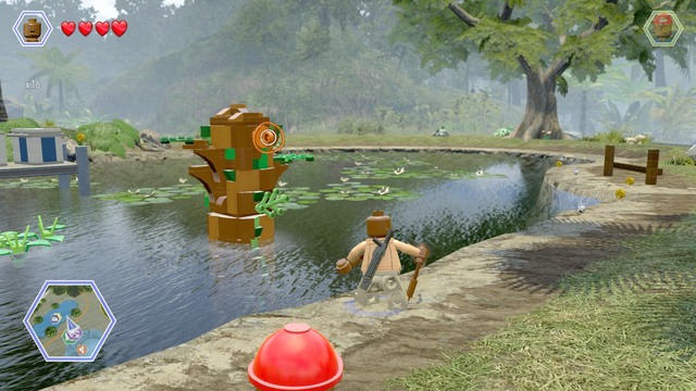 Walk to the column on the water and tilt it with Barrys rope - Visitors Center | Jurassic Park - secrets in free roam - Jurassic Park - secrets in free roam - LEGO Jurassic World Game Guide & Walkthrough