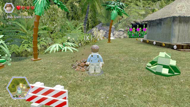 As Grant, walk to the pile of ground and dig up the bricks from it - Dilophosaurus Territory | Jurassic Park - secrets in free roam - Jurassic Park - secrets in free roam - LEGO Jurassic World Game Guide & Walkthrough