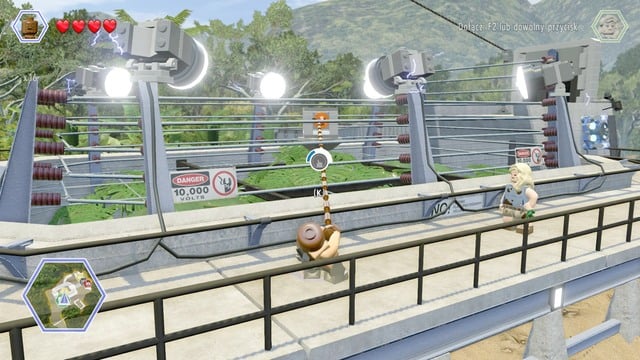 To get the golden brick, stand in the place shown on the picture (its the only place where you can shoot the rope) - Raptor Territory | Jurassic Park - secrets in free roam - Jurassic Park - secrets in free roam - LEGO Jurassic World Game Guide & Walkthrough