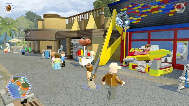 On the roof in the game zone you will find a shield on the left side - Main Street | Jurassic World - secrets in free roam - Jurassic World - secrets in free roam - LEGO Jurassic World Game Guide & Walkthrough