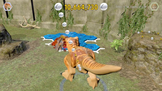 As tyrannosaurus, walk to the platform and destroy the brick objects that blocks access to it - West Boardwalk | Jurassic World - secrets in free roam - Jurassic World - secrets in free roam - LEGO Jurassic World Game Guide & Walkthrough