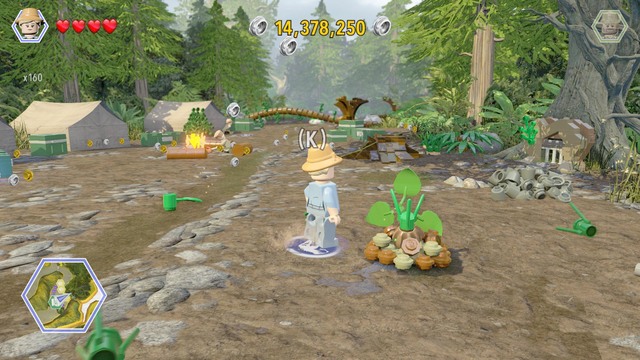 As Ellie, walk to the plant shown on the picture and water it up - Hunter Camp | Jurassic Park - The Lost World - secrets in free roam - Jurassic Park - The Lost World - secrets in free roam - LEGO Jurassic World Game Guide & Walkthrough