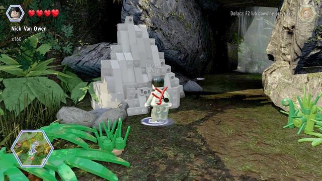 Walk to the rock shown on the picture and destroy it as Owen - Long Grass | Jurassic Park - The Lost World - secrets in free roam - Jurassic Park - The Lost World - secrets in free roam - LEGO Jurassic World Game Guide & Walkthrough