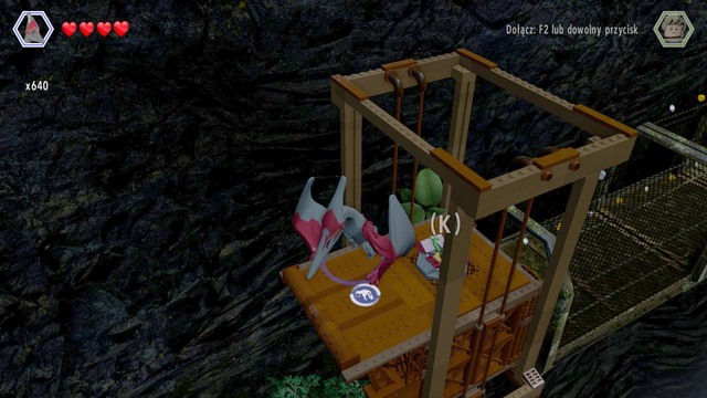 Fly on the elevator shown on the picture and use the lever - Isla Sorna Aviary | Jurassic Park III - secrets in free roam - Jurassic Park III - secrets in free roam - LEGO Jurassic World Game Guide & Walkthrough
