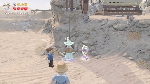 Now, return left, to the spot shown in the screenshot and, as Alan, activate the lever, by tapping quickly the button that appears on the screen - Prologue | Jurassic Park - walkthrough - Jurassic Park - walkthrough - LEGO Jurassic World Game Guide & Walkthrough