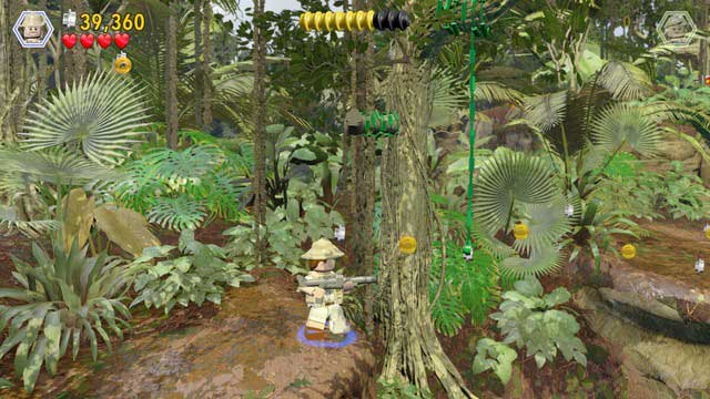 Switch to Robert and fire at another target, whose catch blocks off the liana - Restoring power | Jurassic Park - walkthrough - Jurassic Park - walkthrough - LEGO Jurassic World Game Guide & Walkthrough