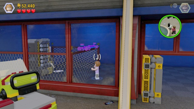 To get the key, you need to cut to Claire or Owen, who are at the other side of the park - Under Attack | Jurassic World - walkthrough - Jurassic World - walkthrough - LEGO Jurassic World Game Guide & Walkthrough