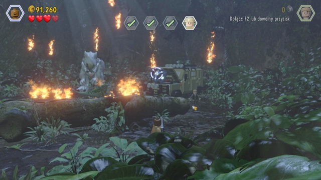 After you climb up, switch to Owen, use camo and walk over to the right, where you find blue bricks - Under Attack | Jurassic World - walkthrough - Jurassic World - walkthrough - LEGO Jurassic World Game Guide & Walkthrough