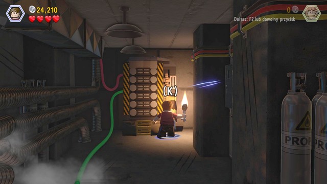 As Zach, enter the dark room and defend against the attacking velociraptor - Main Street Showdown | Jurassic World - walkthrough - Jurassic World - walkthrough - LEGO Jurassic World Game Guide & Walkthrough