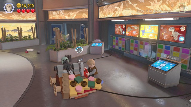 After you climb down, switch to Owen and disable camo - Main Street Showdown | Jurassic World - walkthrough - Jurassic World - walkthrough - LEGO Jurassic World Game Guide & Walkthrough