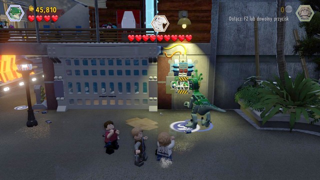 As velociraptor, walk over to the right side, pull the lever shown in the screenshot, switch to Zach and enter the room - Main Street Showdown | Jurassic World - walkthrough - Jurassic World - walkthrough - LEGO Jurassic World Game Guide & Walkthrough