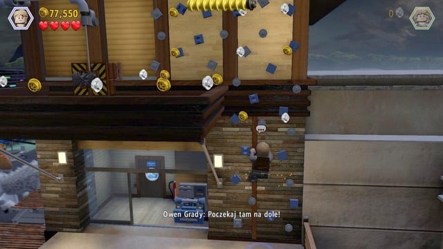 Approach the control panel and lower the blind, over which Owen can reach the higher level - Main Street Showdown | Jurassic World - walkthrough - Jurassic World - walkthrough - LEGO Jurassic World Game Guide & Walkthrough