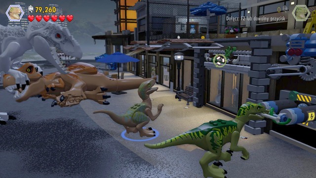 As velociraptor, approach the lever on the right and pull it to gain access to the other one - Main Street Showdown | Jurassic World - walkthrough - Jurassic World - walkthrough - LEGO Jurassic World Game Guide & Walkthrough