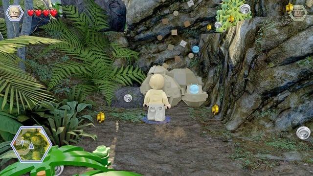 After you reach the location shown in the screenshot, smash the boulders between you and the climbing wall and, using Billys ability, climb up - Breeding facility | Jurassic Park III - walkthrough - Jurassic Park III - walkthrough - LEGO Jurassic World Game Guide & Walkthrough