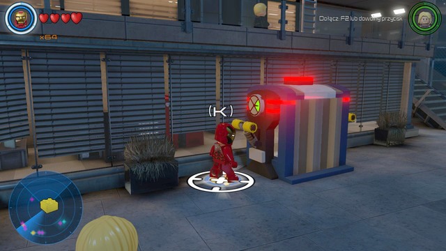 Walk towards the container shown on the picture and lower two levers in order to open it - Golden bricks - S.H.I.E.L.D. Base - secrets - LEGO Marvels Avengers - Game Guide and Walkthrough