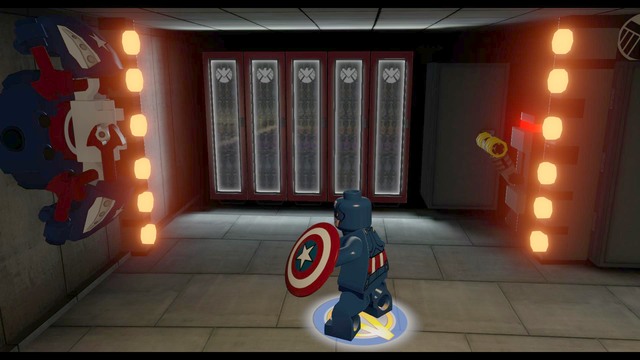 Once inside, switch your character to Captain America and throw the shield at the switch shown on the picture - Golden bricks - S.H.I.E.L.D. Base - secrets - LEGO Marvels Avengers - Game Guide and Walkthrough