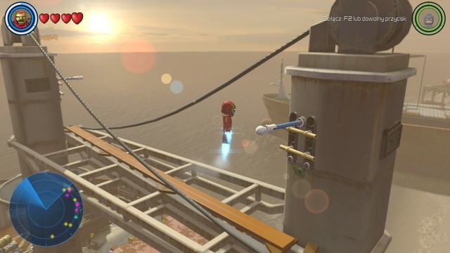 In order to do it you must hang on four handles shown on the picture - Golden bricks - South Africa - secrets - LEGO Marvels Avengers - Game Guide and Walkthrough