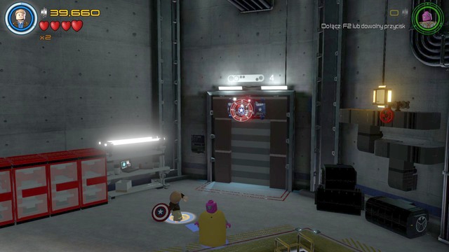 On the left side of the garage you will find a switch that can be used with Captains America shield - Minikits - A Loki Entrance - secrets - LEGO Marvels Avengers - Game Guide and Walkthrough