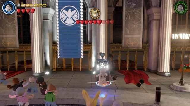 Walk towards the building shown on the picture during the battle with Loki - Characters - Shakespeare in the Park - secrets - LEGO Marvels Avengers - Game Guide and Walkthrough